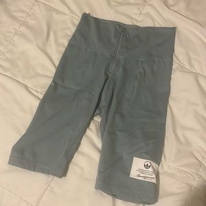 Adidas zip-up biker shorts. Size M